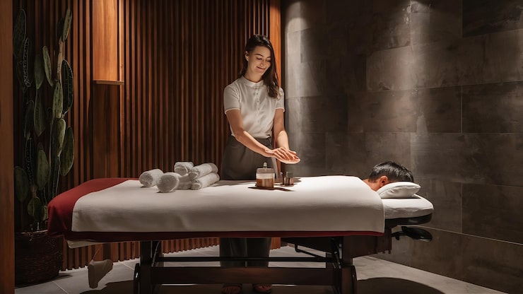 beautiful-spa-composition-massage-table-wellness-center-copyspace_926199-2778099
